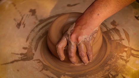 potter at work makes ceramic dishes. india, rajasthan.