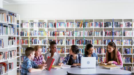 Schoolkids-studying-in-library-4k