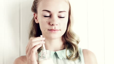 Pretty-girl-drinking-milk-with-straw