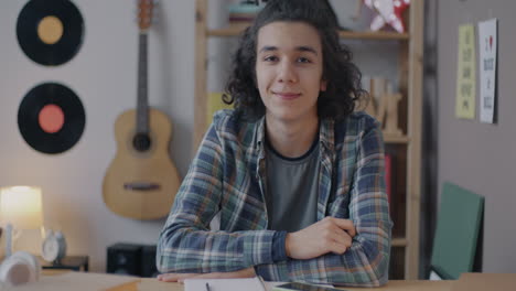 teenager studying in a room