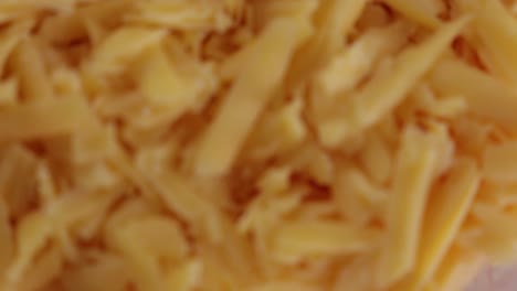 panorama de cerca, toma superior sobre el queso rallado