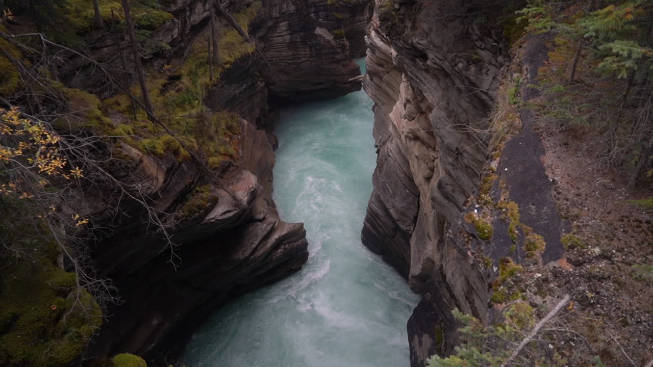 Athabasca River Canyon, Jasper National Park, Alberta, Canada, Downstream of Scenic Falls, Alpine Water Rapids, Slow Motion