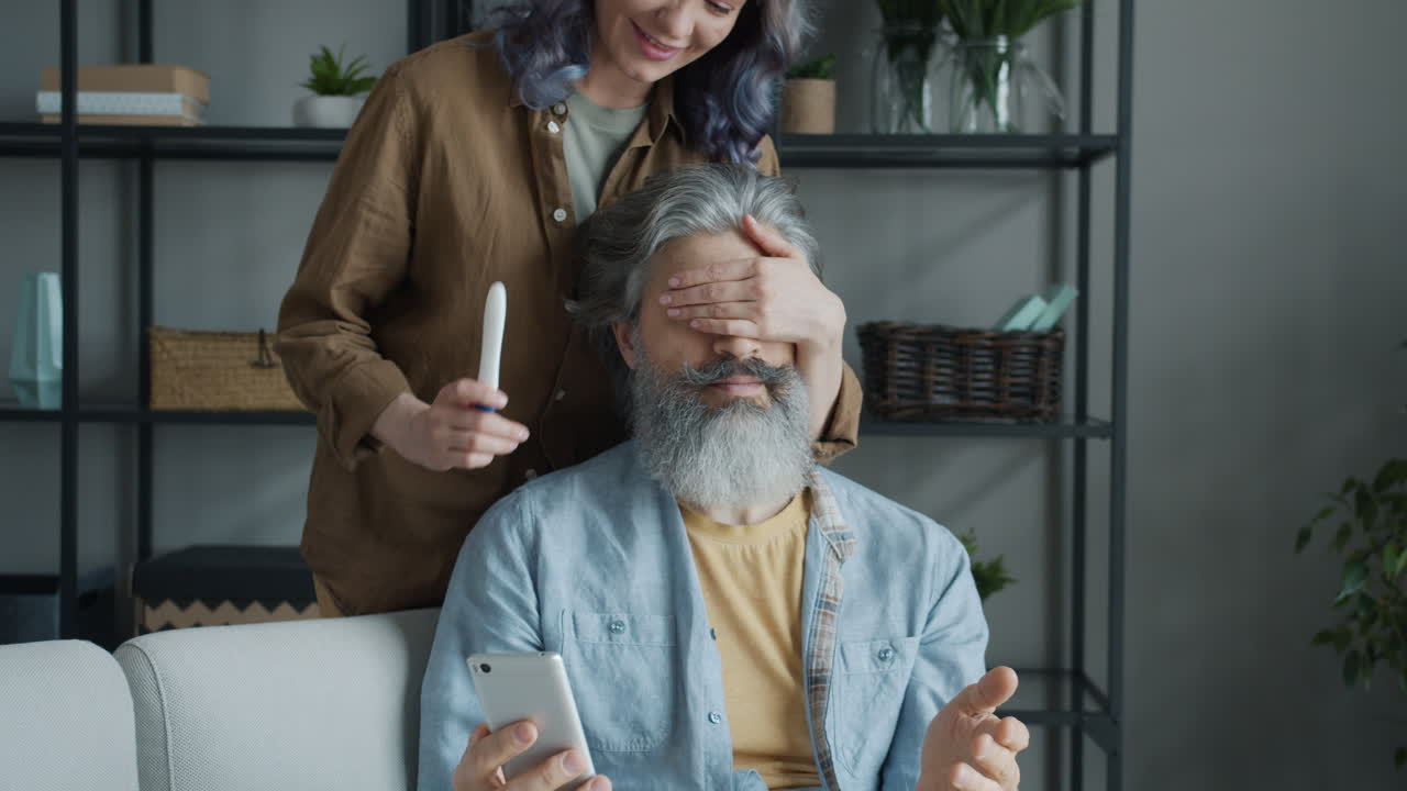 Happy Couple Reacting to Pregnancy Test