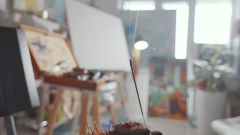 Burning-Incense-Stick-in-Art-Studio