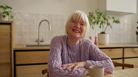 smiling senior woman in kitchen
