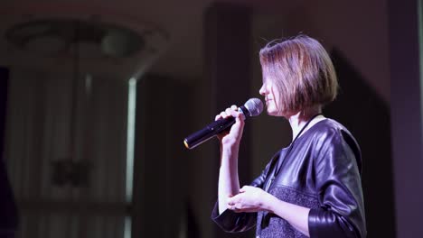 woman speaking at a conference