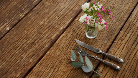 various cutlery on wooden table 4k