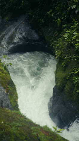 waterfall in a mossy canyon