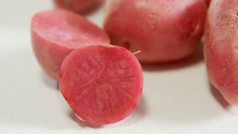 red potatoes placed on white background 4k 4k