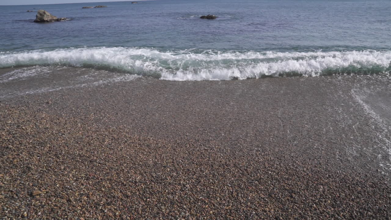 sea wave on a rocky beach in south korea (shoot info: Cin2, 1080p,  59.94fps)