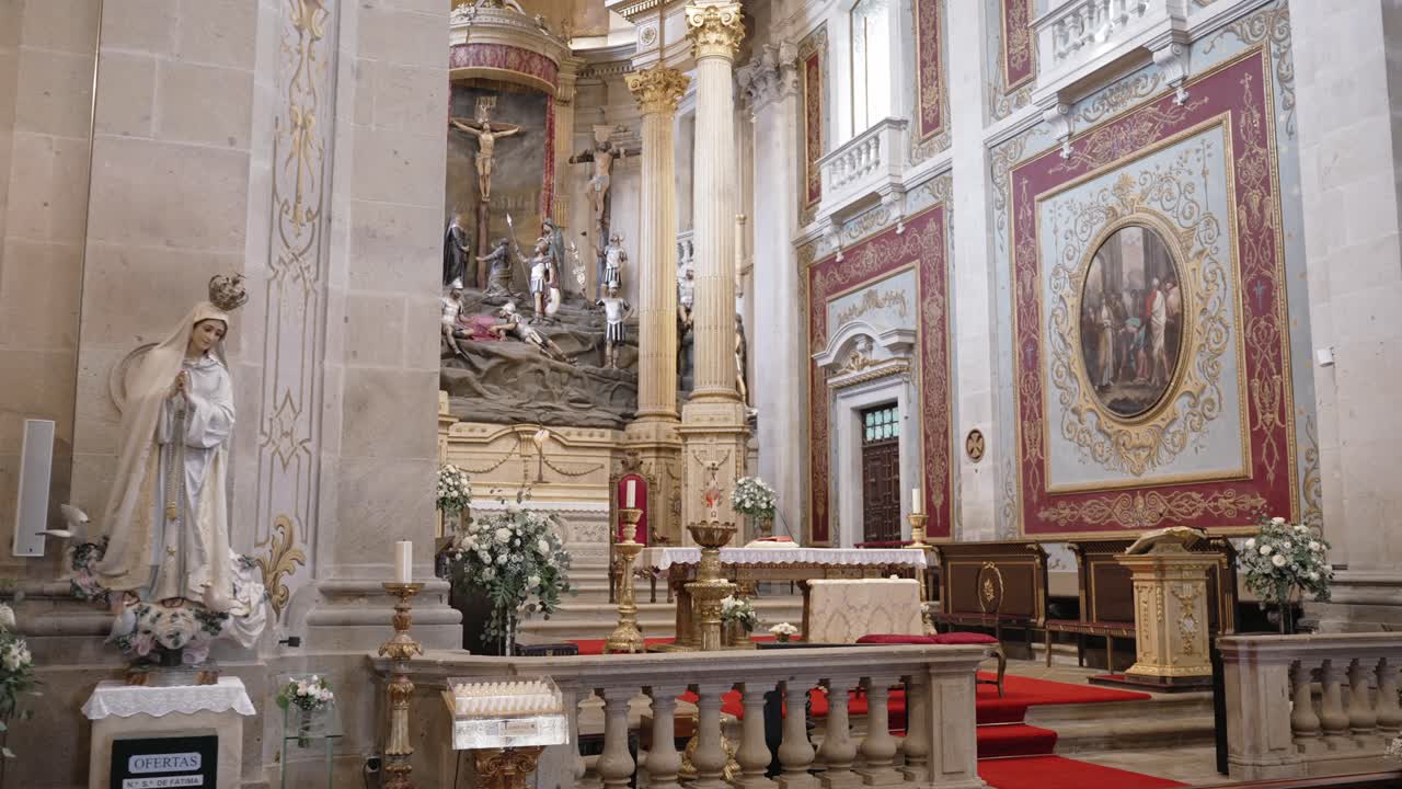 ornate altar and floral wedding decor inside Bom Jesus church in Braga Portugal