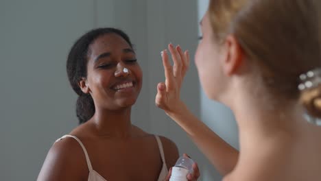 friends applying cream