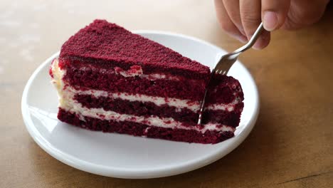 Chocolate-and-cream-cake-on-a-plate-on-table