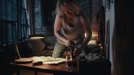 man in an apartment at night