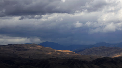 timelapse of rainclouds over mountains 1