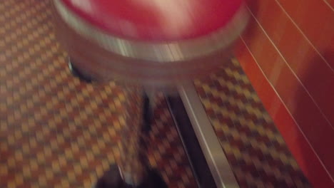 camera movement over old nostalgic american diner bar stools