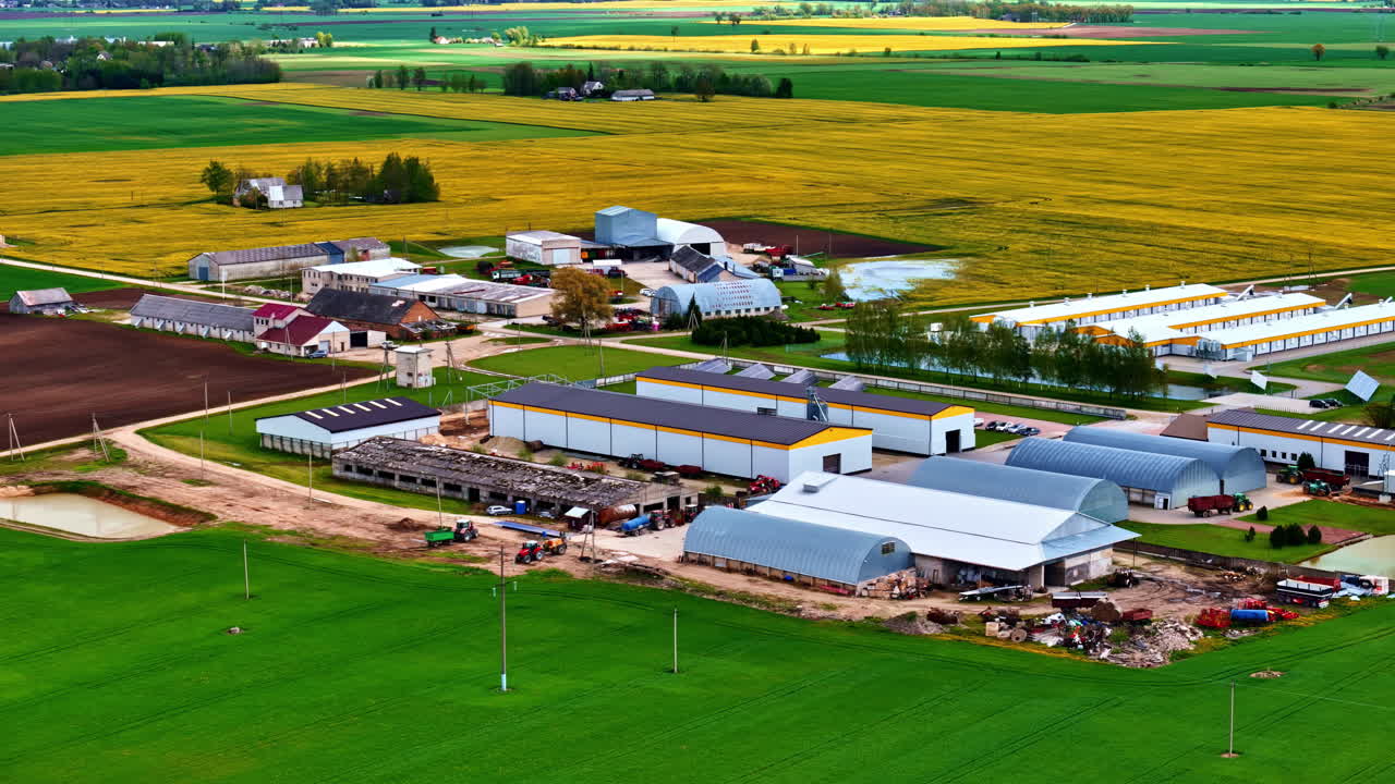 Agriculture farm warehouse industrial modern looking business, aerial drone view