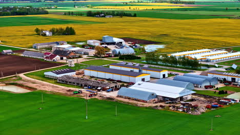 agriculture farm warehouse industrial modern looking business, aerial drone view