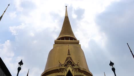 tourists explore the temple of the emerald buddha