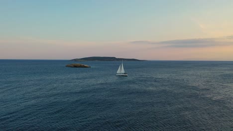 aerial - sailing boat sailing in vouliagmeni