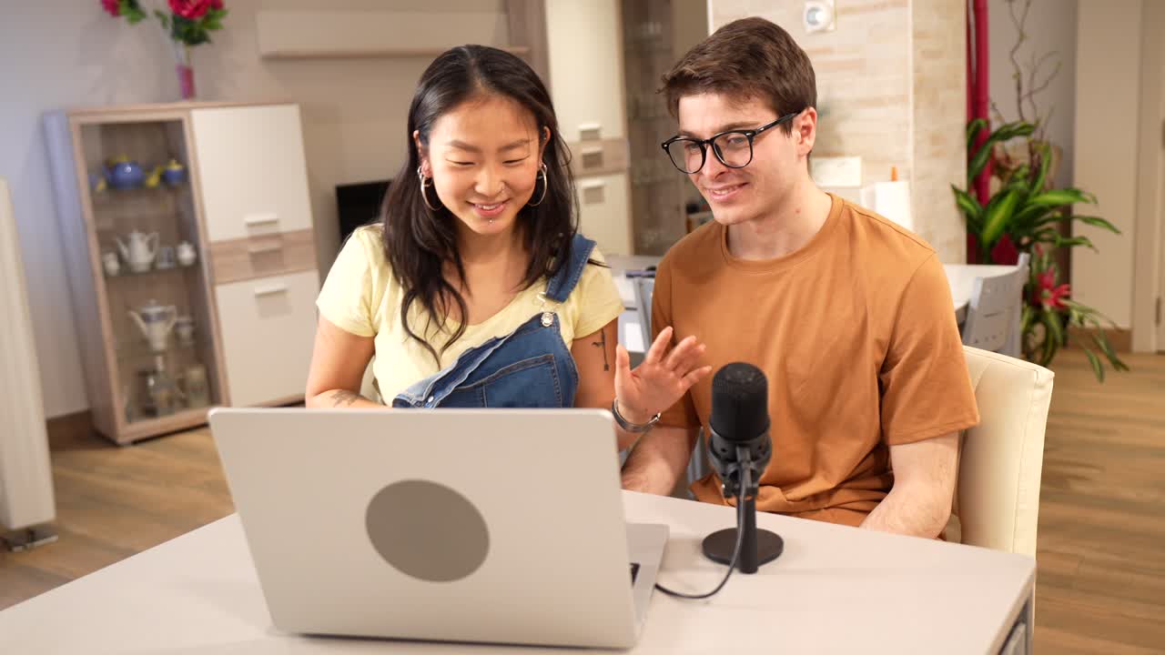 Two People Having a Video Call on a Laptop