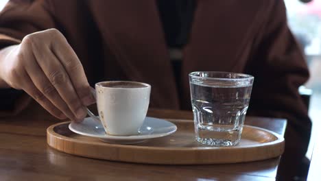 turkish coffee and water at cafe