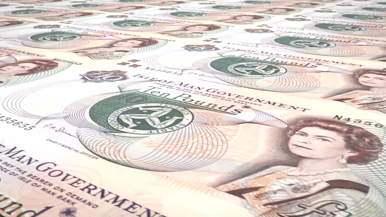 Banknotes of ten manx pounds of Isle of Man rolling, cash money, loop