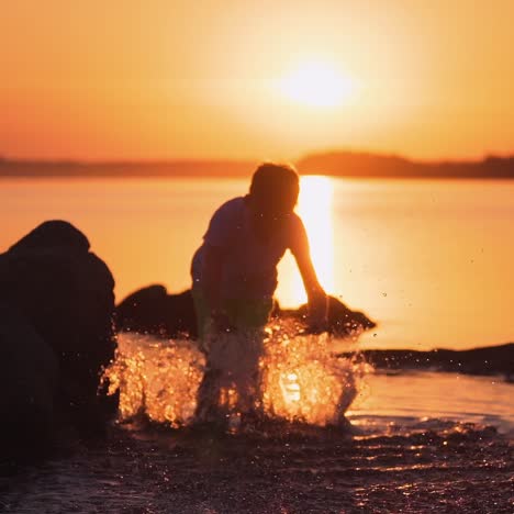 boy near water pond