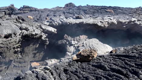 Steaming-cave-in-hot-volcanic-rock-in-Iceland