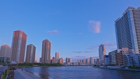 Evening-Tokyo,-Tsukuda,-Toyosu-skyscrapers-and-bridge-the-Sumida-River