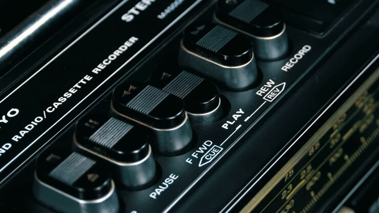 Pushing Button on a Tape Recorder, Play, Stop, Rec, ff, Rew