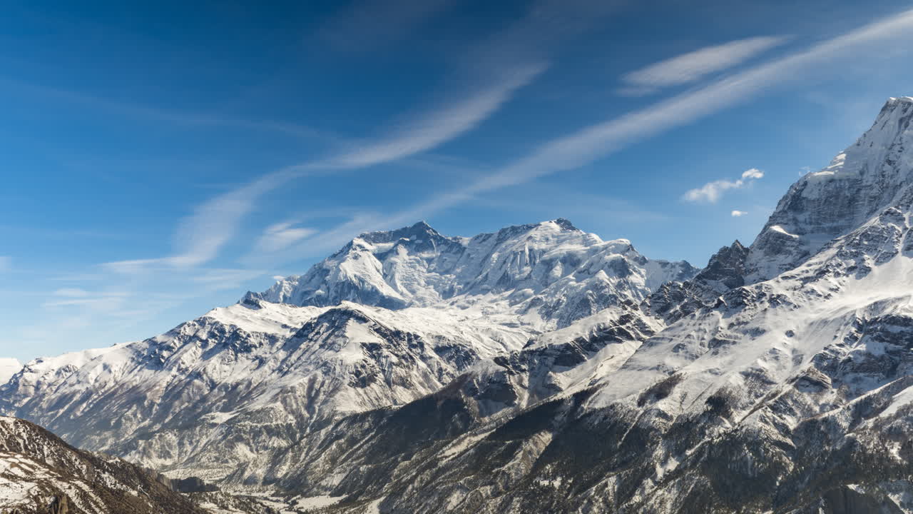 Annapurna Two Mountain Day Timelapse overlooking the valley with moving clouds