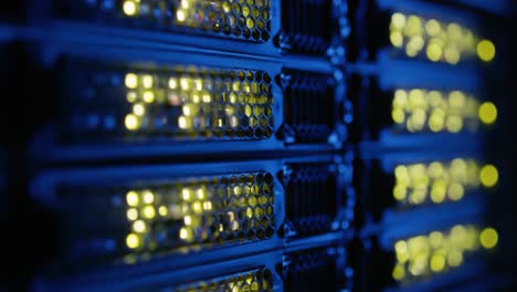 an intricate view of a server rack illuminated with vibrant led lights, highlighting the complex technology inside modern data centers
