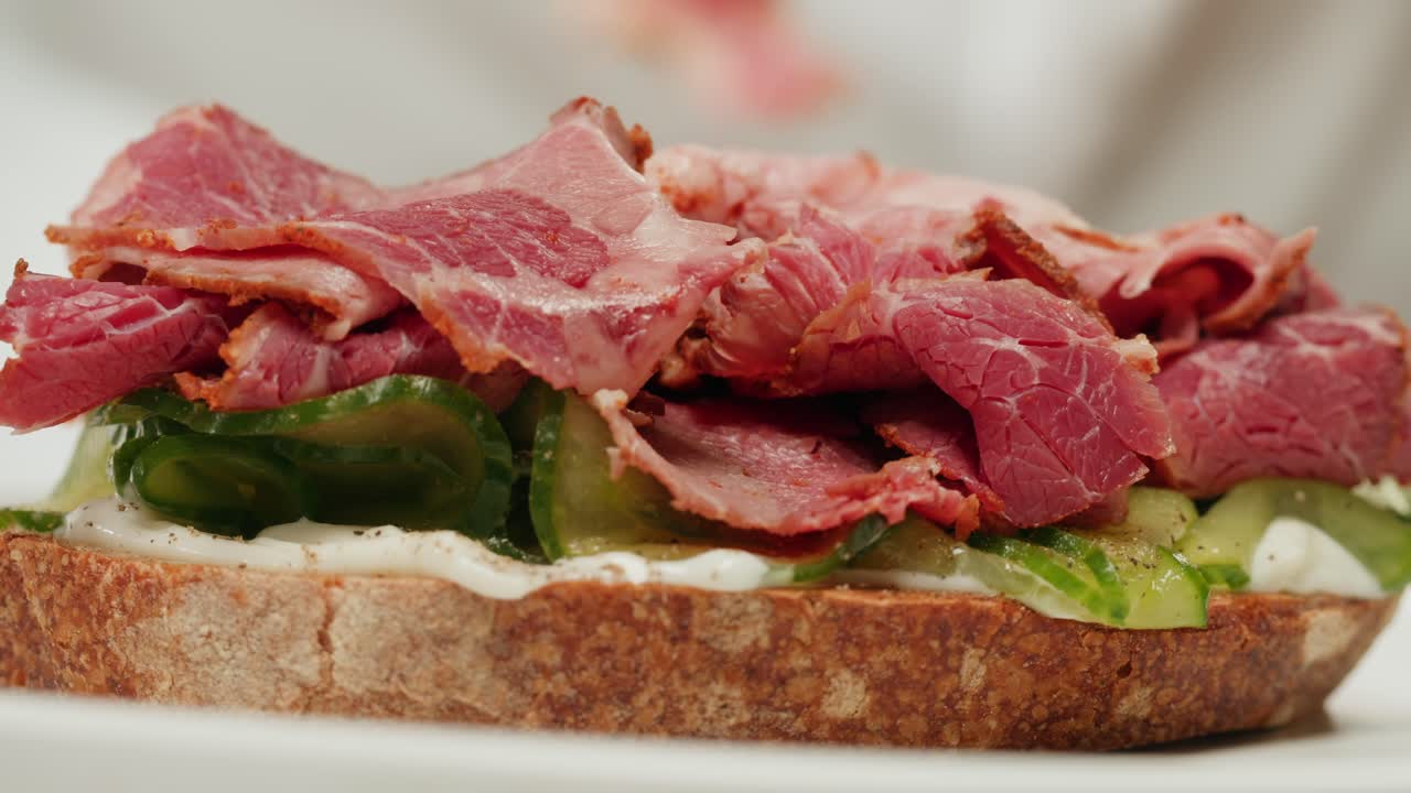 Close up of a Gourmet Pastrami Cucumber Sandwich