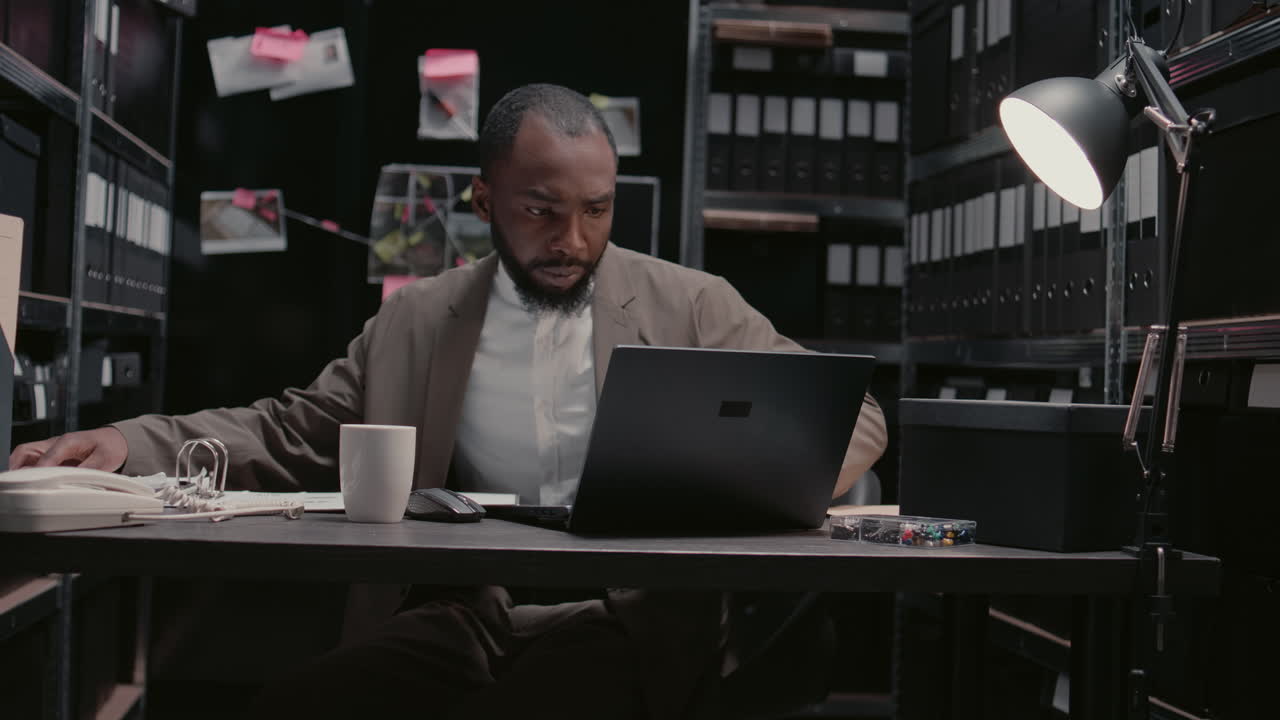 Detective working in office