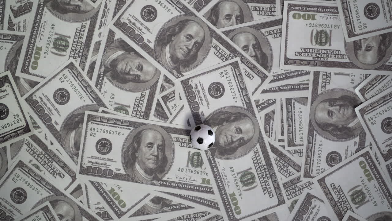 Soccer ball and dollars
