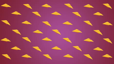 animación digital de múltiples iconos de aviones de papel amarillo flotando contra un fondo rosado