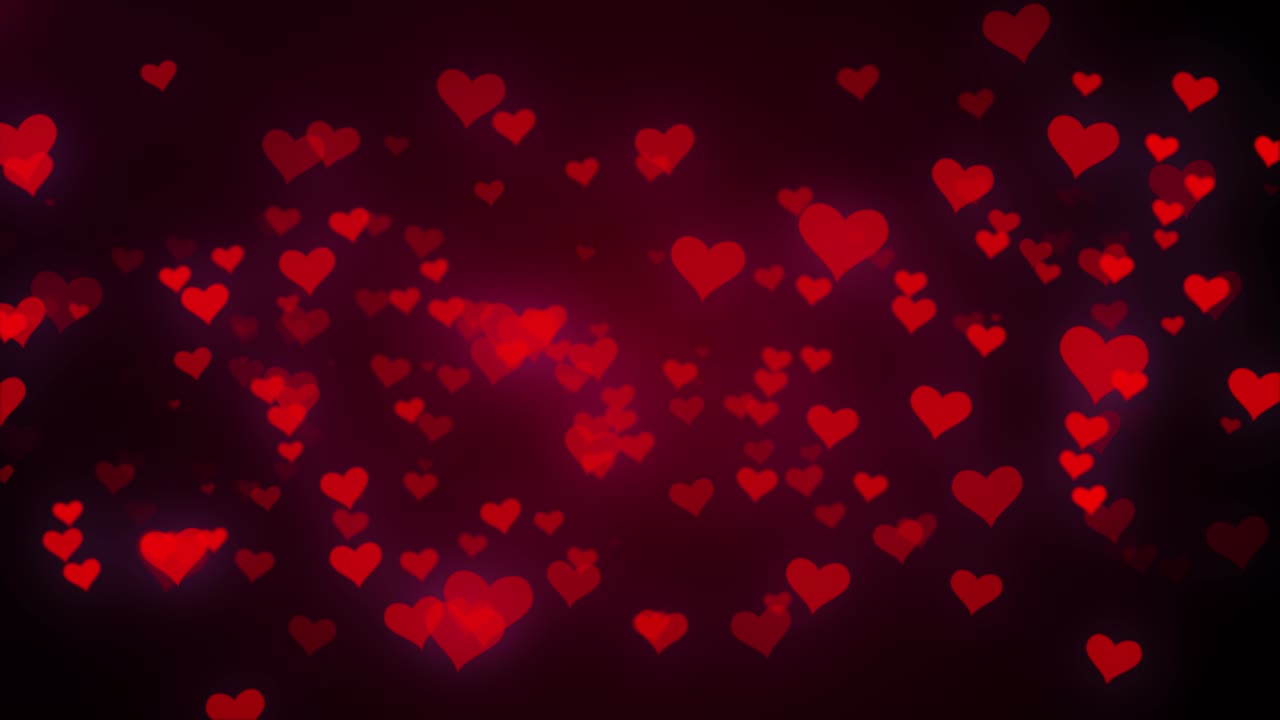 corazones rojos y blancos sobre un fondo de bucle negro. telón de fondo.