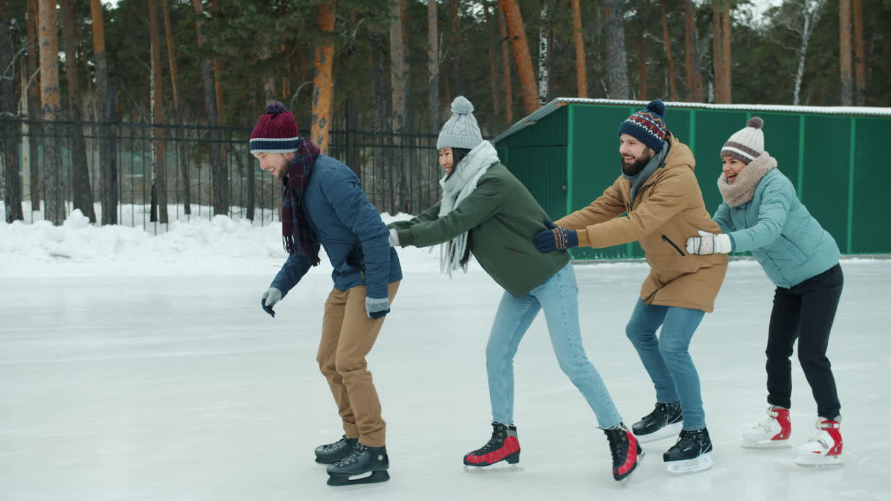 Friends Ice Skating in Winter Park
