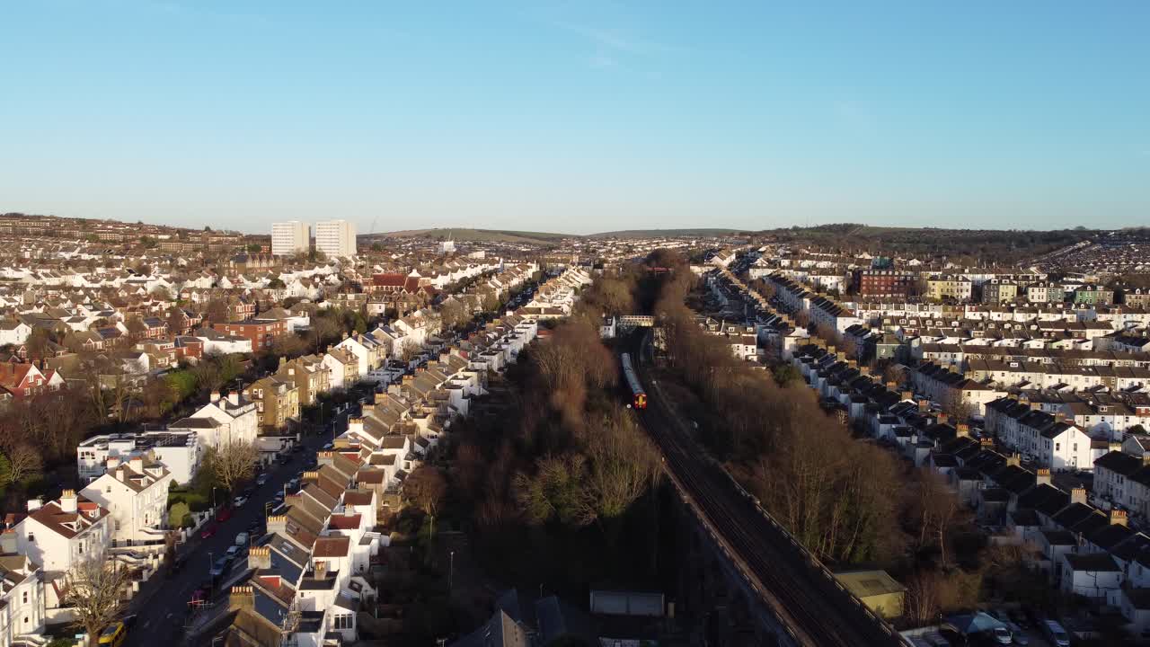 Aerial View of Suburban Residential Area with Train Tracks