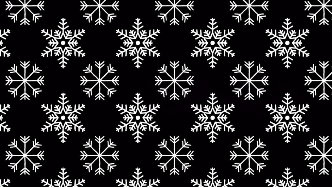 Digital animation of snowflakes icons in seamless pattern against black background