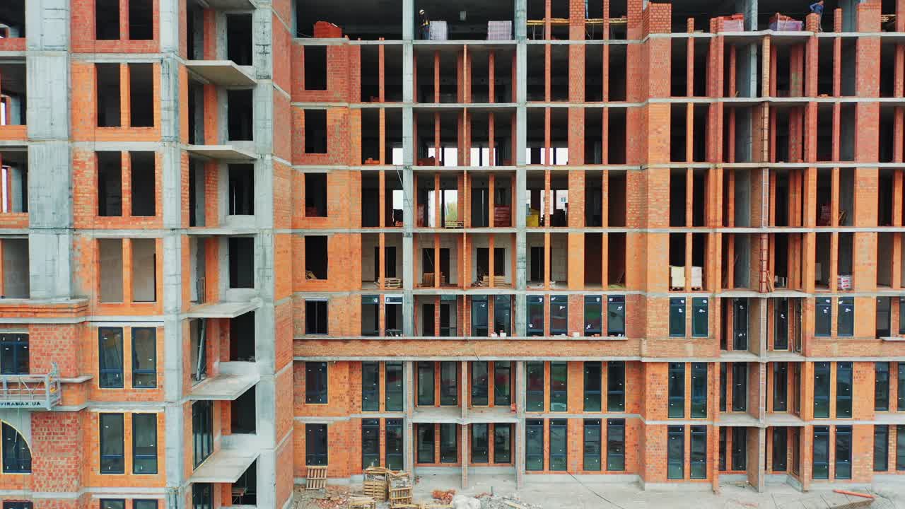 New house in residential complex. Aerial view of construction building at construction site
