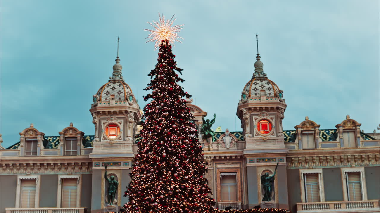 Monte Carlo , Monaco -December 23, 2024: Lighted Christmas tree in front of the Monte Carlo Casino