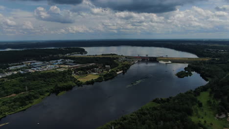 kaunas lagoon and hydroelectric power plant on cloudy stormy day, aerial high angle view