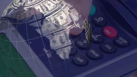 animation of globe made of dollars over payment terminal