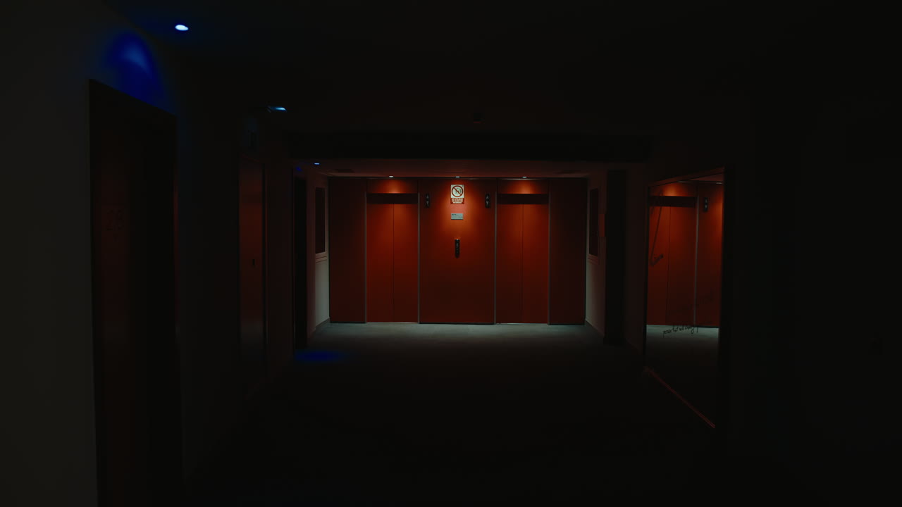 Dark Elevator Hallway at Night