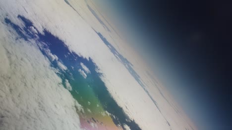 fantasy planet with colorful water and black curved horizon and motion of rotation