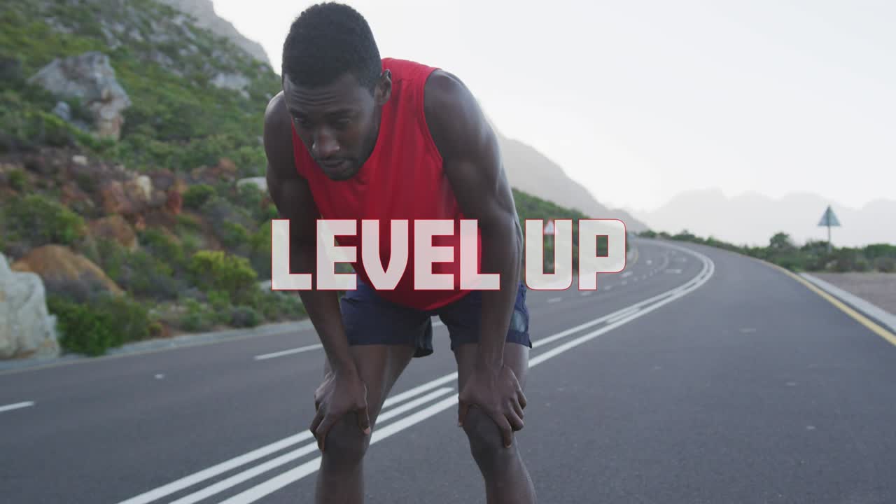 Animation of the words level up in white over man exercising on mountain road taking a rest