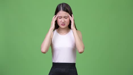 young beautiful asian businesswoman hav
