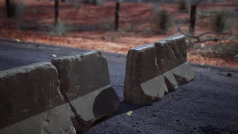 old rusted concrete road barrier blocks